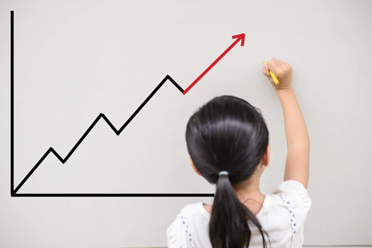 Picture of a child drawing a graph.