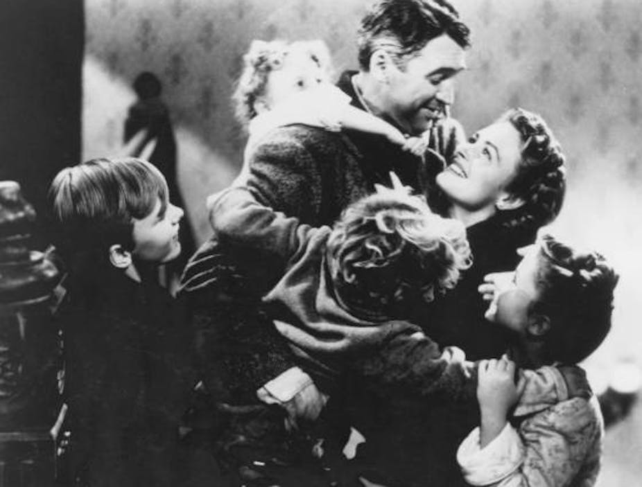 A still showing George Bailey and family.