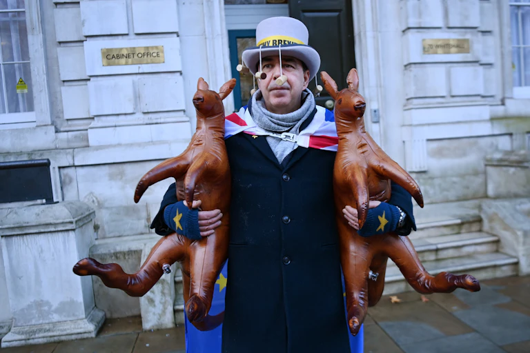 Pro-EU protester mocks the Prime Minister Boris Johnson's 'Australian Deal' outside the Cabinet Office in London, Britain.
