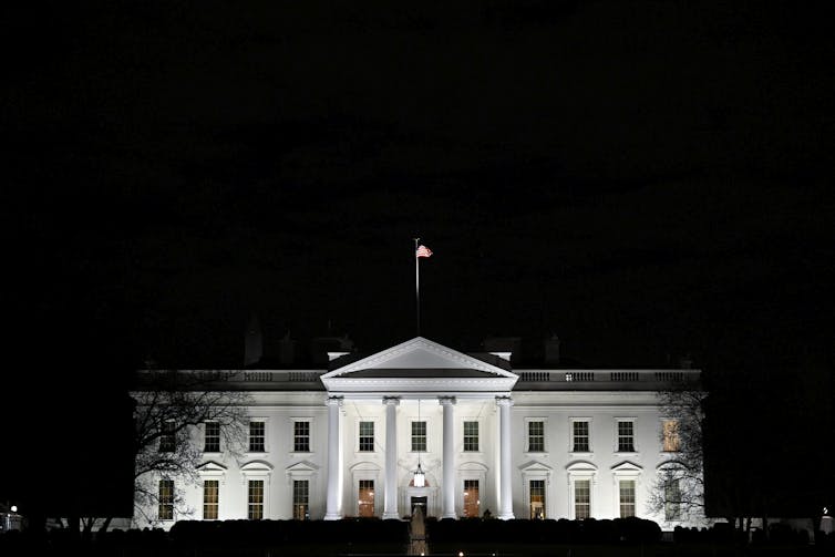 The White House at night.