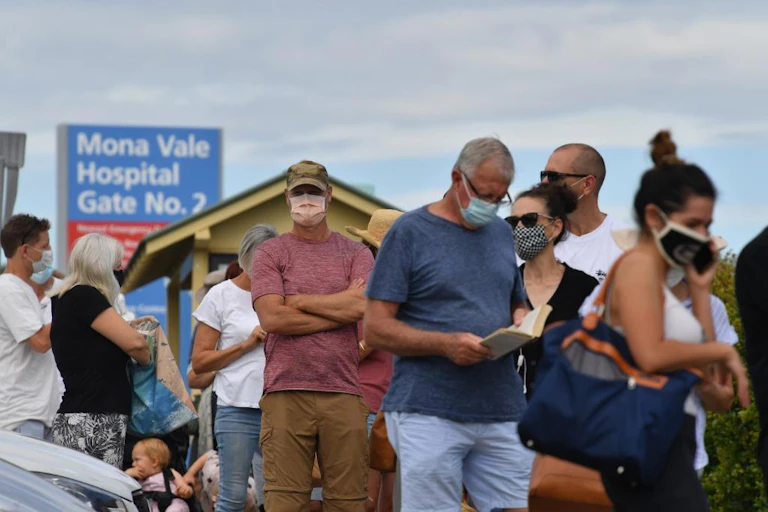 People in Sydney line up for COVID testing