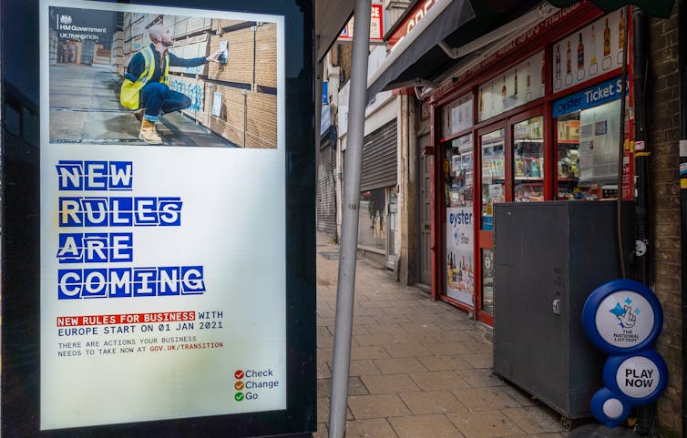 Brexit sign at bus stop on UK high street reads: