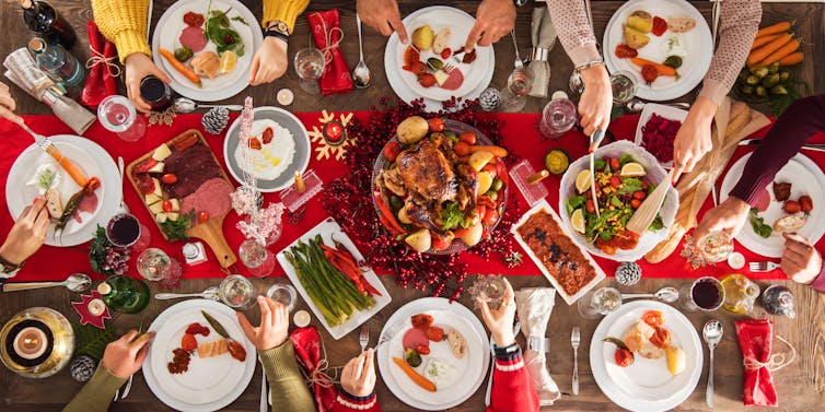 Table full of Christmas food.