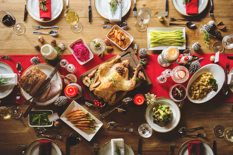Large Christmas spread on table – lots of different plates.