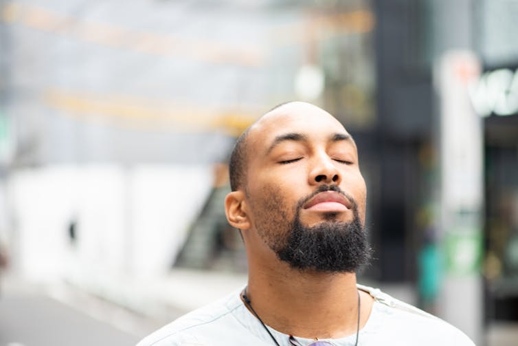 A man who is meditating.