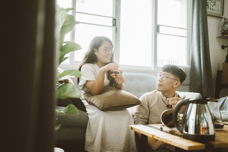 couple calmly enjoying tea together