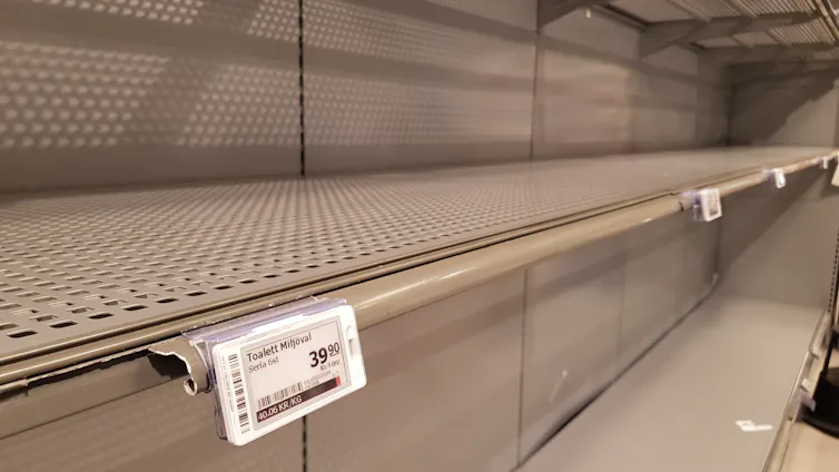 Sweden, Stockholm : 2020, March 17 : The empty shelf of toilet paper in the supermarket in Stockholm, Sweden.