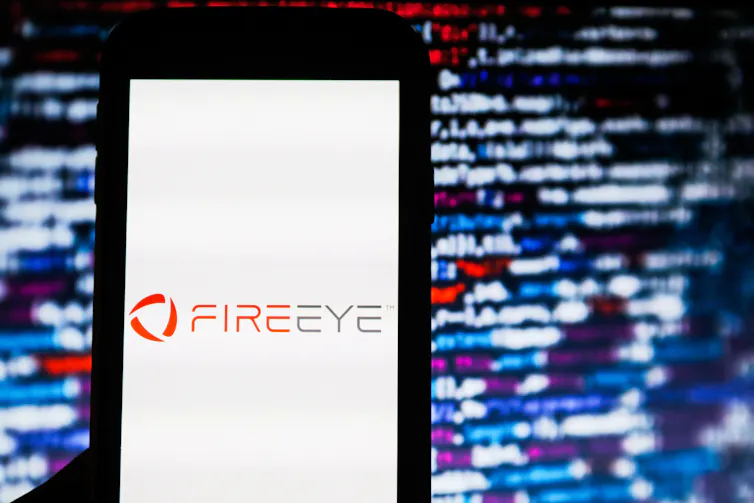 A smart phone displaying the FireEye logo