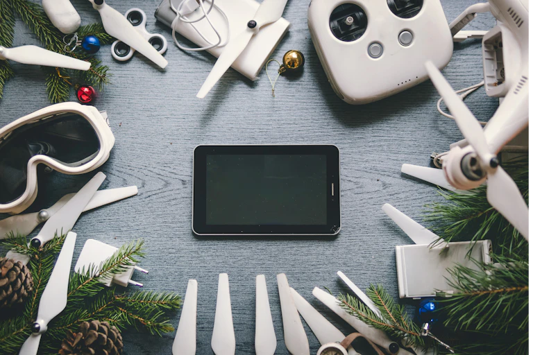 Christmas gifts laid out including various devices and gadgets.