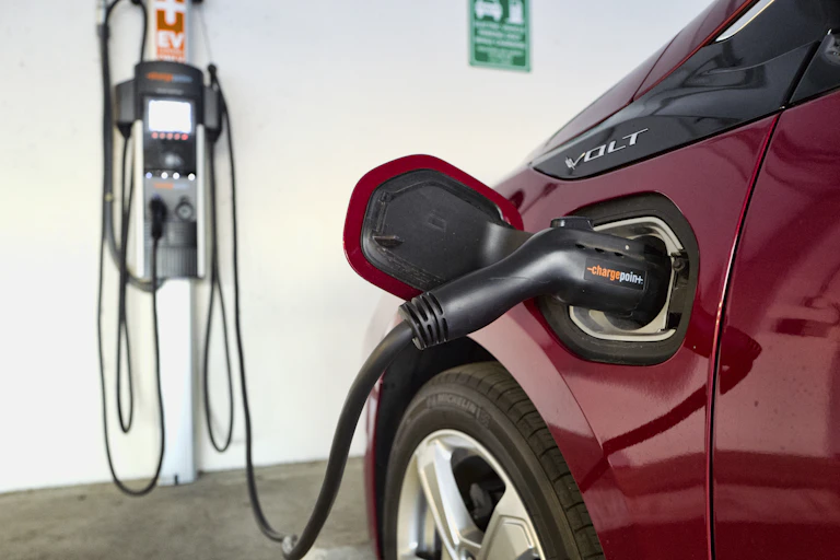 Electric vehicle being recharged