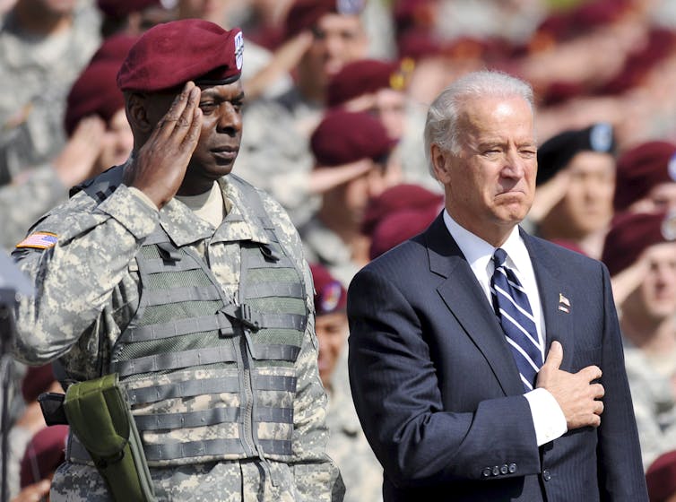 US president-elect Joe Biden, right, with General Lloyd Austin in 2009.