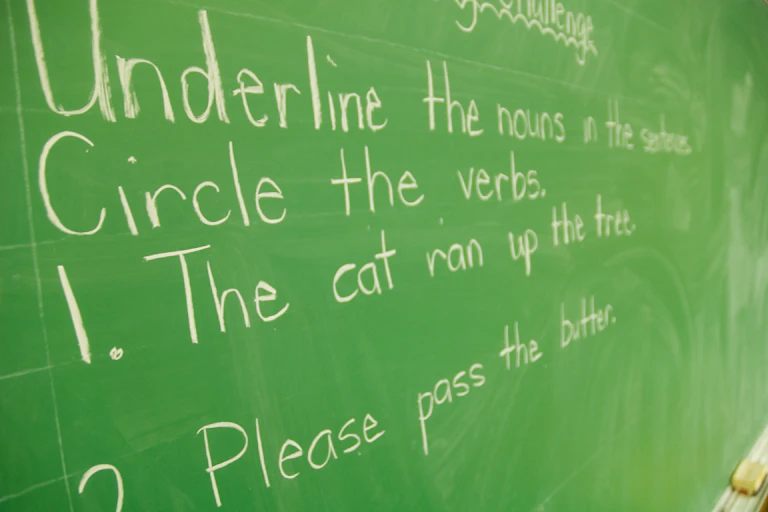 Chalkboard with grammar lesson