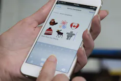 Tim Hortons emojis on a smartphone.