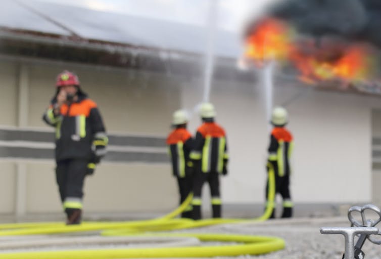 Firefighters put out a solar panel fire