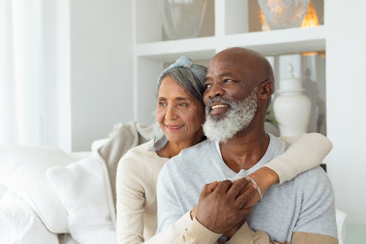 An older couple in their home