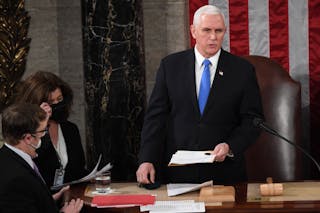 Vice President Mike Pence presides over the joint session of Congress reviewing Electoral College votes on Jan. 6, 2021.