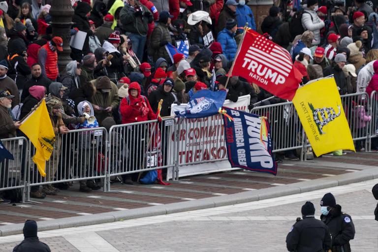 Gadsden flags fly at a Jan. 6, 2021 protest at the Capitol