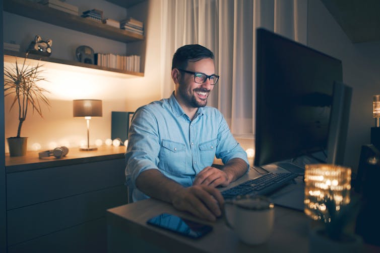 man working in home office
