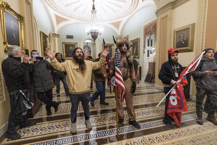 'Delighting in causing complete chaos': what's behind Trump supporters' brazen storming of the Capitol