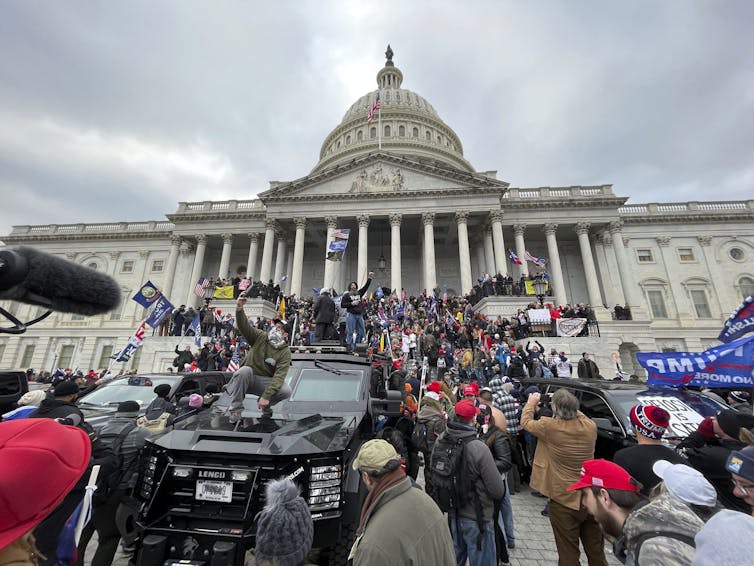 Hundreds of Trump supporters stormed the Capitol