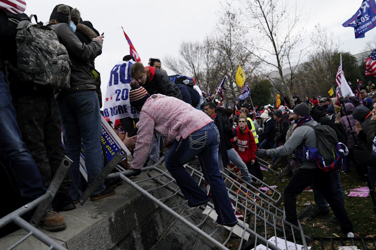 Trump supporters rioting outside the US Capitol.