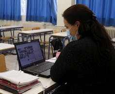 A teacher teaching online.