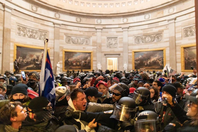Police intervenes in US President Donald Trumps supporters who breached security and entered the Capitol building in Washington D.C., United States on January 06, 2021.