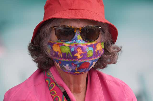 Older woman wearing a mask