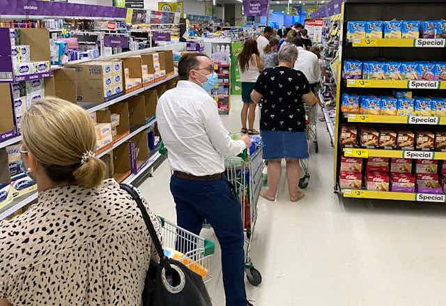 Brisbane shoppers buy groceries before the lockdown