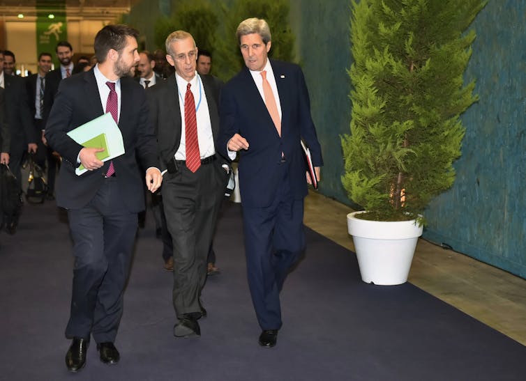 Kerry, Stern and Deese walking.