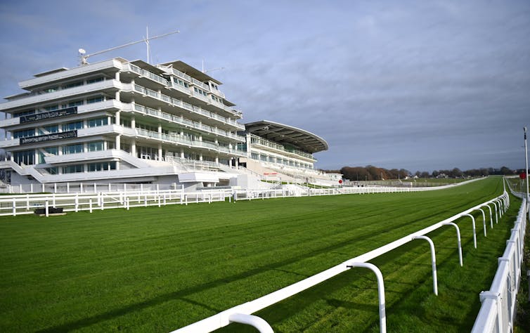 Building overlooking grass horseracing course