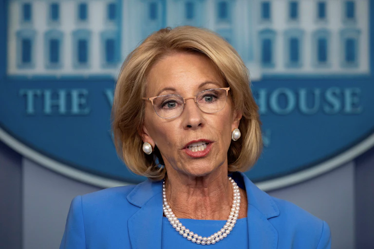 A headshot of Betsy Devos, US Secretary of Education.