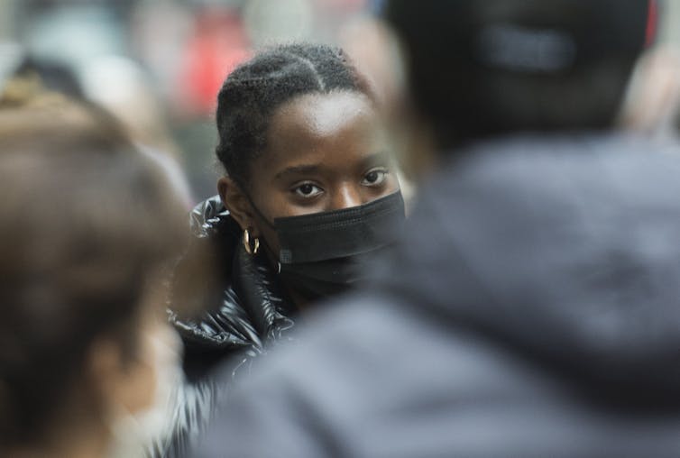 Masked people on the street