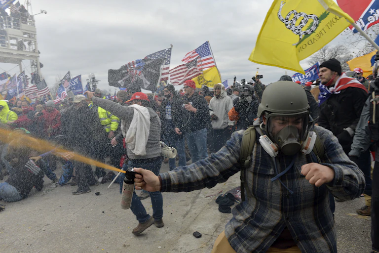 Trump supporters clash with police and security forces as people try to storm the US Capitol.