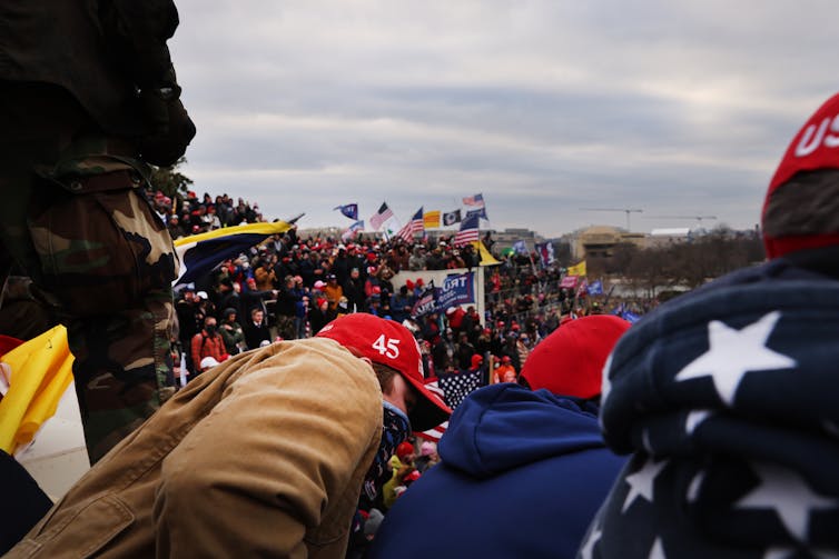 Crowd flying flags