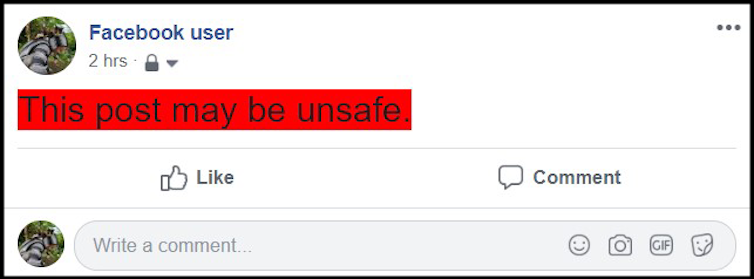 A Facebook warning where text is covered in a block.