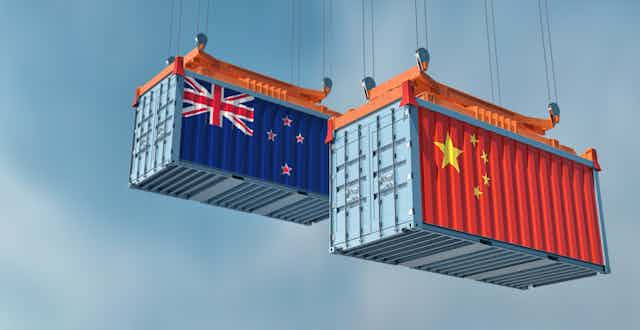Shipping container with NZ and Chines flags painted on sides