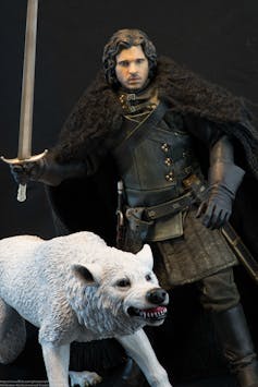 Jon Snow from Game of Thrones with his dire wolf.