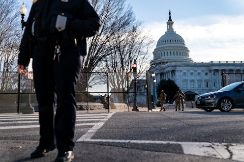 Capitol siege raises questions over extent of white supremacist infiltration of US police