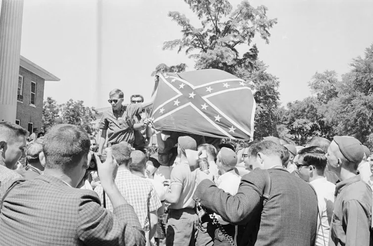 Western Inserection Flag The Confederate battle flag, which rioters flew inside the US Capitol ...