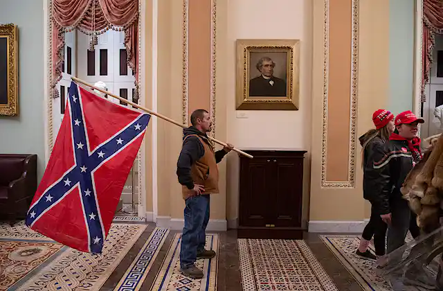 Western Inserection Flag The Confederate battle flag, which rioters flew inside the US Capitol ...