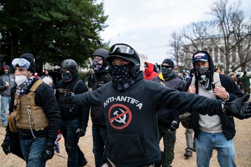 The far-right rioters at the Capitol were not antifa – but violent groups often blame rivals for unpopular attacks