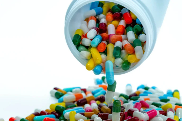 Pills being dumped from a bottle
