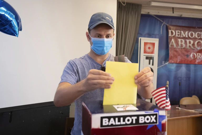 A man voting.