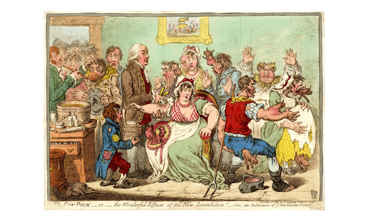 An engraving showing crowds pushing into a room where Jenner vaccinates a woman; other people are seen with cow heads growing out of their bodies.
