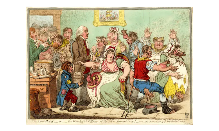 An engraving showing crowds pushing into a room where Jenner vaccinates a woman; other people are seen with cow heads growing out of their bodies.