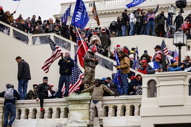 Rioters mass on the US Capitol steps