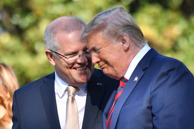 Prime Minister Scott Morrison laughs with US President Donald Trump in 2019