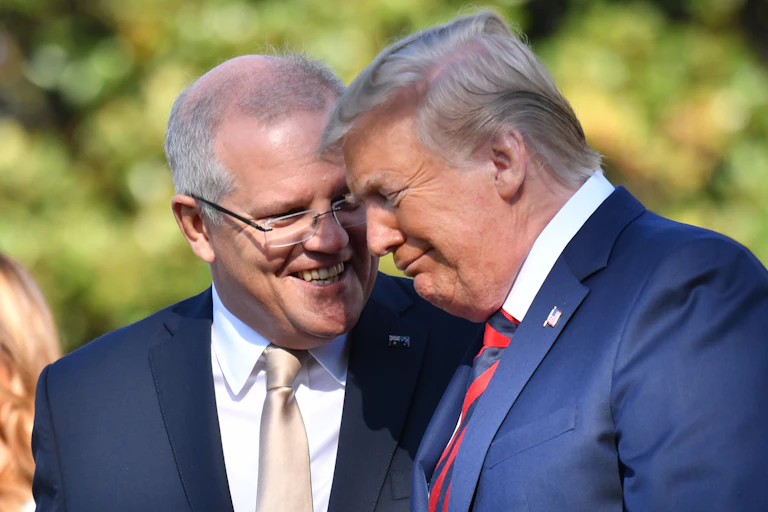 Prime Minister Scott Morrison laughs with US President Donald Trump in 2019