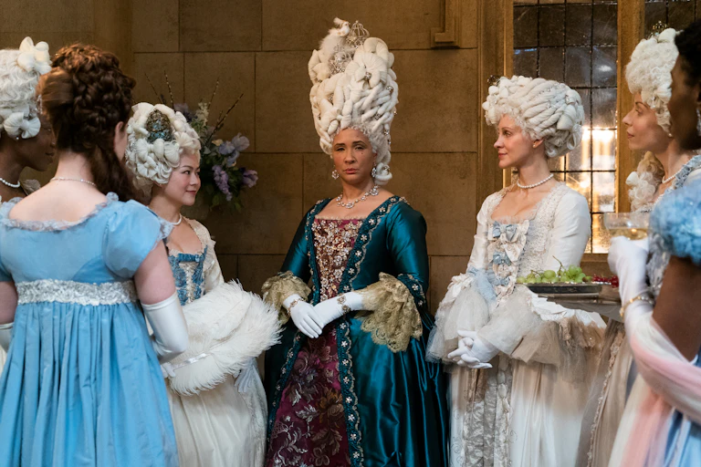 Women in Regency period constumes.